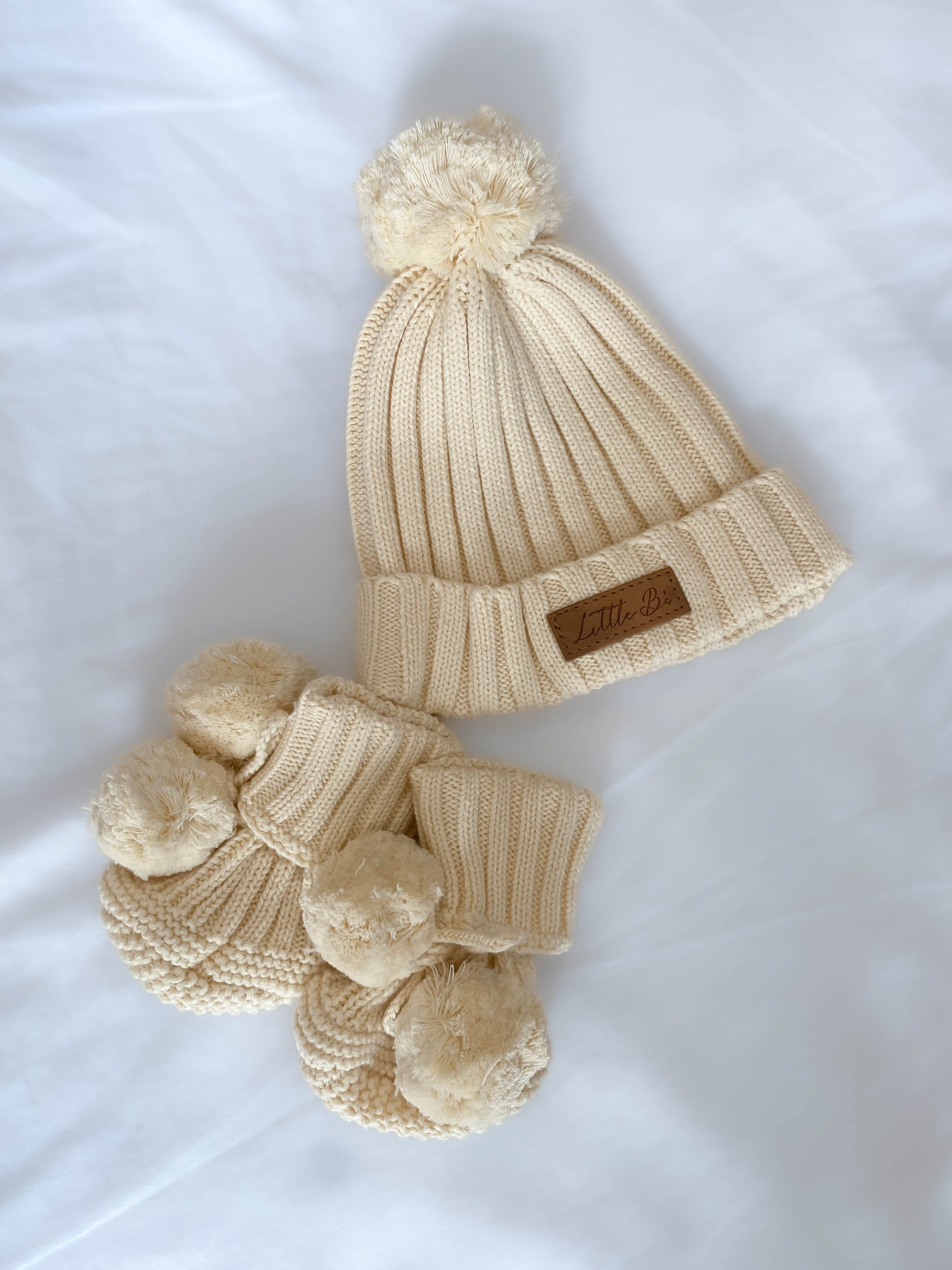 Little B's Knitted Pom Pom Booties in yellow with matching hat